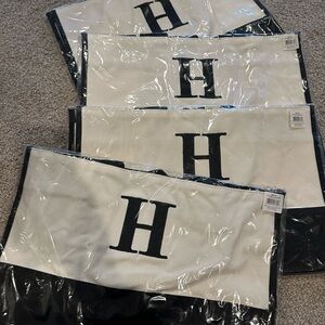 4 Elegant embroidered “H” Black and White Monogram canvas bags